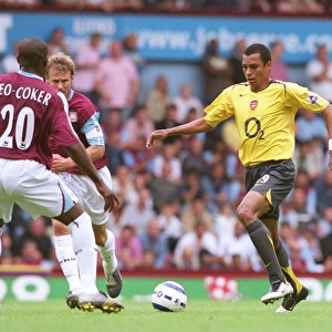 Gilberto (Arsenal) Nigel Reo-Coker (West Ham). West Ham United 0: 0 Arsenal