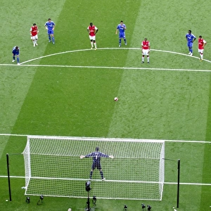Gilberto (Arsenal) waits to take his penalty