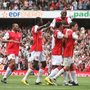 Gilberto celebrates scoring the Arsenal goal with Cesc Fabregas