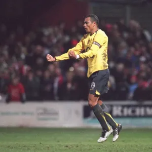 Gilberto celebrates scoring for Arsenal during the penalty shoot out