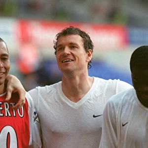 Gilberto, Jens Lehmann and Kolo Toure (Arsenal) celebrate winning the league