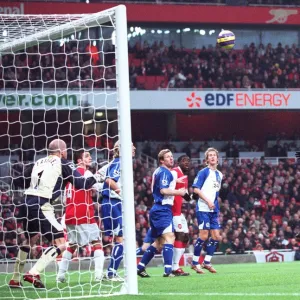 Gilberto scores Arsenals 1st goal under pressure from Brett Emerton (Blackburn)