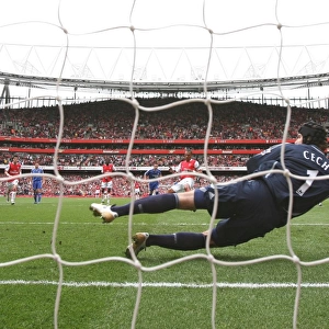 Gilberto shoots past Chelsea goalkeeper Petr Cech to score the Arsenal from the penalty spot