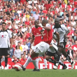 Gilberto shoots past Fulham goalkeeper Antti Niemi to score the 3rd Arsenal goal from the penalty spot. Arsenal 3: 1 Fulham, Barclays Premiership, Emirates Stadium, London, 29 / 4 / 2007. Credit: Stuart MacFarlane / Arsenal Gilberto shoots past Fulham goalkeeper Antti Niemi to score the 3rd Arsenal goal from the penalty spot. Arsenal 3: 1 Fulham, Barclays Premiership, Emirates Stadium, London, 29 / 4 / 2007. Credit: Stuart MacFarlane / Arsenal