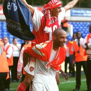 Gilberto and Thierry Henry (Arsenal) celebrate at the end of the match Gilberto and Thierry Henry (Arsenal) celebrate at the end of the match
