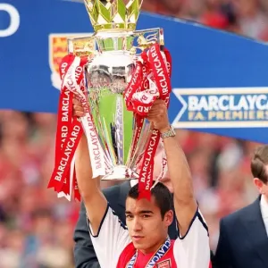 Giovanni van Bronckhorst with the F. A. Barclaycard Premiership Trophy Giovanni van Bronckhorst with the F. A. Barclaycard Premiership Trophy