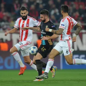 Giroud Goes Head-to-Head with Siovas and da Costa in Olympiacos vs Arsenal UEFA Champions League Clash Giroud Goes Head-to-Head with Siovas and da Costa in Olympiacos vs Arsenal UEFA Champions League Clash