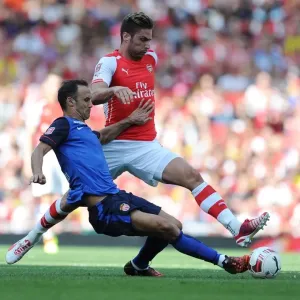 Giroud vs. Carvalho: Intense Battle at the Emirates Cup