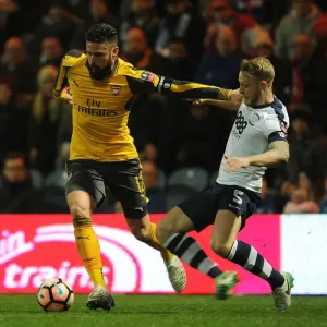 Giroud vs Clarke: A FA Cup Battle - Arsenal Forward Clashes with Preston Defender