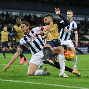 Giroud vs Evans: A Premier League Tackle Battle at The Hawthorns Giroud vs Evans: A Premier League Tackle Battle at The Hawthorns