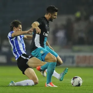 Giroud vs Hutchinson: A Fierce Rivalry in the Capital One Cup - Arsenal vs Sheffield Wednesday (2015-16)