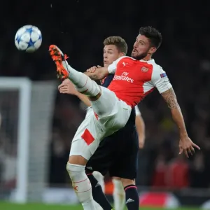 Giroud vs. Kimmich: Intense Battle in Arsenal FC vs. FC Bayern Munich UEFA Champions League Clash Giroud vs. Kimmich: Intense Battle in Arsenal FC vs. FC Bayern Munich UEFA Champions League Clash