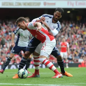 Giroud vs Lescott: Intense Battle at Emirates Stadium during Arsenal vs West Brom Clash Giroud vs Lescott: Intense Battle at Emirates Stadium during Arsenal vs West Brom Clash