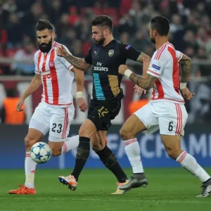 Giroud's Intense Battle with Siovas and da Costa: Olympiacos vs. Arsenal UEFA Champions League Clash Giroud's Intense Battle with Siovas and da Costa: Olympiacos vs. Arsenal UEFA Champions League Clash