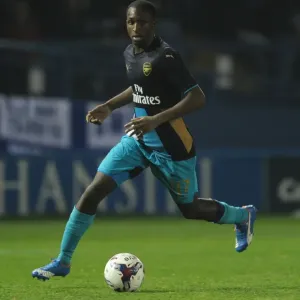 Glen Kamara in Action: Arsenal's Midfield Maestro Shines in Capital One Cup Clash vs. Sheffield Wednesday
