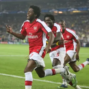 Four Goal Blitz: Song, Adebayor, and Diaby Celebrate Arsenal's Dominant 5-2 Win Over Fenerbahce in the UEFA Champions League Four Goal Blitz: Song, Adebayor, and Diaby Celebrate Arsenal's Dominant 5-2 Win Over Fenerbahce in the UEFA Champions League