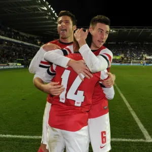 Four Goal Blitz: Walcott, Giroud, and Koscielny Celebrate Arsenal's Victory Over Reading in the Capital One Cup