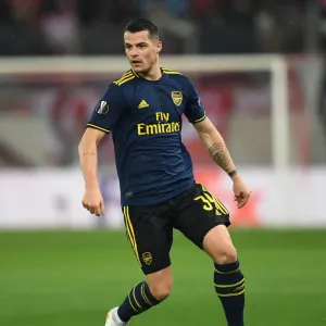 Granit Xhaka in Action: Arsenal vs. Olympiacos, UEFA Europa League Round of 32 (Piraeus, 2020) Granit Xhaka in Action: Arsenal vs. Olympiacos, UEFA Europa League Round of 32 (Piraeus, 2020)