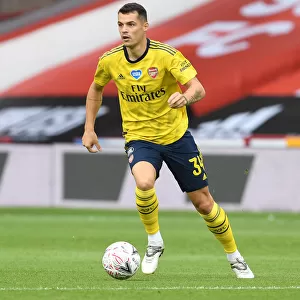 Granit Xhaka in Action: Arsenal's FA Cup Battle against Sheffield United
