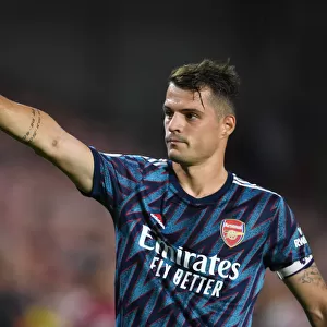 Granit Xhaka in Action: Arsenal's Midfield Maestro Shines Against Brentford in Premier League 2021-22