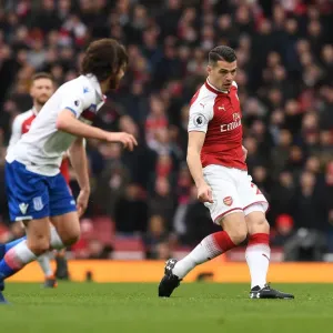 Granit Xhaka: Arsenal Midfielder in Action against Stoke City, Premier League 2017-18 Granit Xhaka: Arsenal Midfielder in Action against Stoke City, Premier League 2017-18