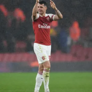 Granit Xhaka: Arsenal's Determined Midfielder Amidst Arsenal FC vs Manchester United Rivalry (2018-19)