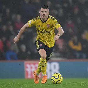 Granit Xhaka: Arsenal's Midfield Maestro in Action vs. AFC Bournemouth, Premier League 2019-20