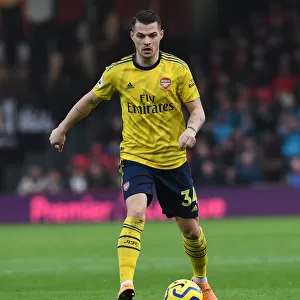 Granit Xhaka: Arsenal's Midfield Maestro in Action Against AFC Bournemouth (Premier League 2019-20)