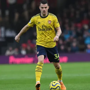 Granit Xhaka: Arsenal's Midfield Maestro in Action Against AFC Bournemouth (Premier League 2019-20)
