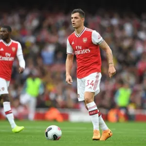 Granit Xhaka: Arsenal's Midfield Maestro in Action vs. Aston Villa (Premier League 2019-20)