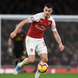 Granit Xhaka: Arsenal's Midfield Mastermind in Action against Huddersfield Town, Premier League 2018-19 Granit Xhaka: Arsenal's Midfield Mastermind in Action against Huddersfield Town, Premier League 2018-19