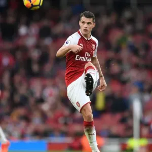 Granit Xhaka: Arsenal's Midfield Mastermind in Action against Swansea City, Premier League 2017-18 Granit Xhaka: Arsenal's Midfield Mastermind in Action against Swansea City, Premier League 2017-18