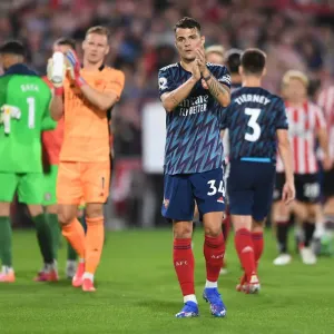 Granit Xhaka Celebrates with Arsenal Fans after Brentford Victory - Premier League 2021-22 Granit Xhaka Celebrates with Arsenal Fans after Brentford Victory - Premier League 2021-22