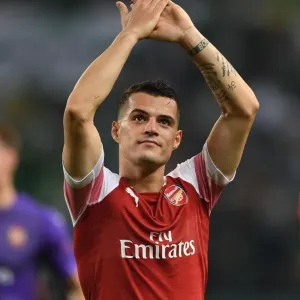 Granit Xhaka Celebrates with Arsenal Fans after UEFA Europa League Win over Sporting Lisbon Granit Xhaka Celebrates with Arsenal Fans after UEFA Europa League Win over Sporting Lisbon