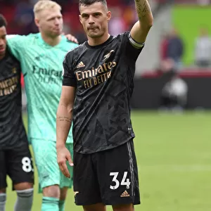 Granit Xhaka Celebrates Arsenal's Win at Brentford Community Stadium