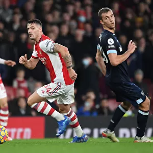Granit Xhaka Surges Past West Ham's Alex Kral in Arsenal's Premier League Clash