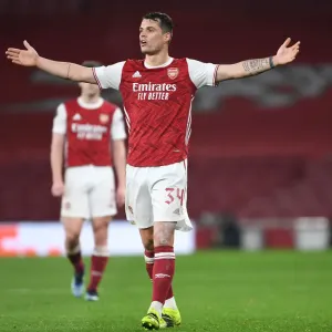 Granit Xhaka in UEFA Europa League Action: Arsenal vs. Olympiacos (Behind Closed Doors, 2021) Granit Xhaka in UEFA Europa League Action: Arsenal vs. Olympiacos (Behind Closed Doors, 2021)