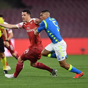 Granit Xhaka vs Allan: Intense Clash in Napoli v Arsenal UEFA Europa League Quarterfinal