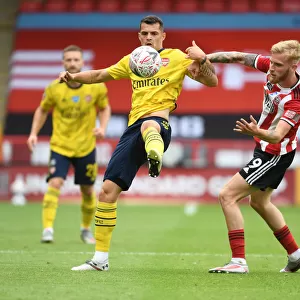 Granit Xhaka vs Olivier McBurnie: Intense Clash in FA Cup Quarterfinal between Sheffield United and Arsenal