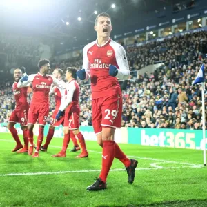 Granit Xhaka's Euphoric Goal Celebration: Arsenal's Triumph over West Bromwich Albion (2017-18)
