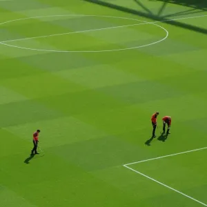 The groudstaff work on the pitch before the match. Arsenal 2: 0 West Bromwich Albion The groudstaff work on the pitch before the match. Arsenal 2: 0 West Bromwich Albion