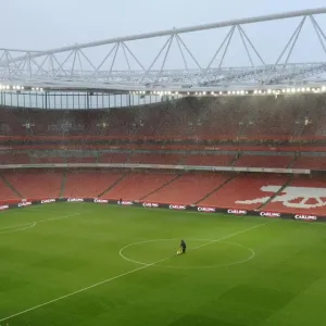 The Groundsman marks out the pitch before the match. Arsenal 2: 0 Wigan Athletic