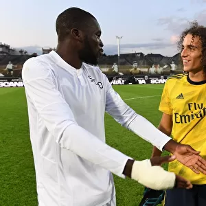 Guendouzi and Kanga Share a Moment After Angers vs. Arsenal Pre-Season Friendly