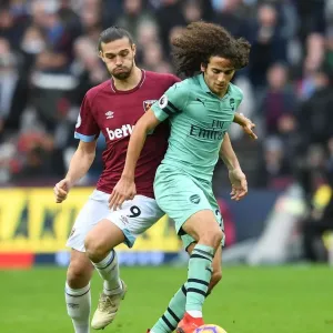 Guendouzi vs. Carroll: Battle in the Premier League - West Ham United vs. Arsenal FC Guendouzi vs. Carroll: Battle in the Premier League - West Ham United vs. Arsenal FC
