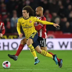 Print of Guendouzi vs McGoldrick in Premier League action