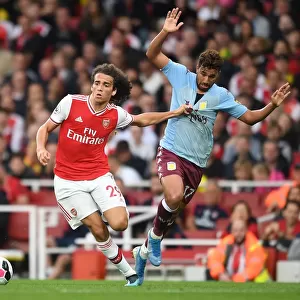 Guendouzi vs Trezeguet: Intense Clash Between Arsenal's Young Gun and Aston Villa Star (2019-20 Premier League)
