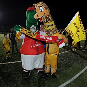 Gunnersaurus vs. Jenny the Giraffe: A FA Cup Fifth Round Mascot Showdown