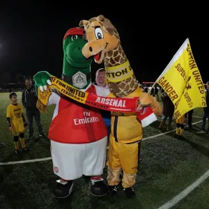 Gunnersaurus vs. Jenny the Giraffe: A FA Cup Fifth Round Mascot Showdown