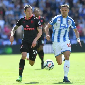 Hector Bellerin vs. Chris Lowe: Intense Battle in Huddersfield Town vs. Arsenal Premier League Clash Hector Bellerin vs. Chris Lowe: Intense Battle in Huddersfield Town vs. Arsenal Premier League Clash