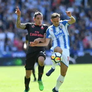 Hector Bellerin vs. Chris Lowe: A Premier League Battle at Huddersfield Hector Bellerin vs. Chris Lowe: A Premier League Battle at Huddersfield